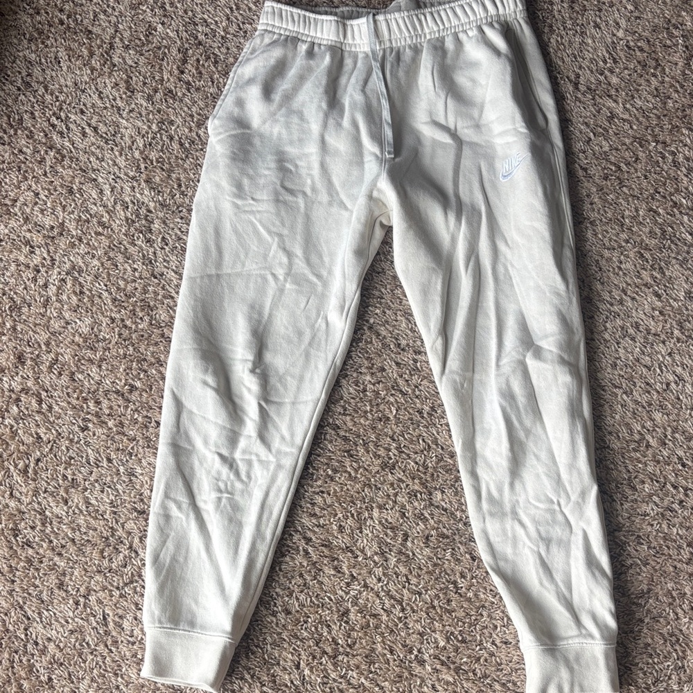 Men’s Nike cream sweatpants, size Small